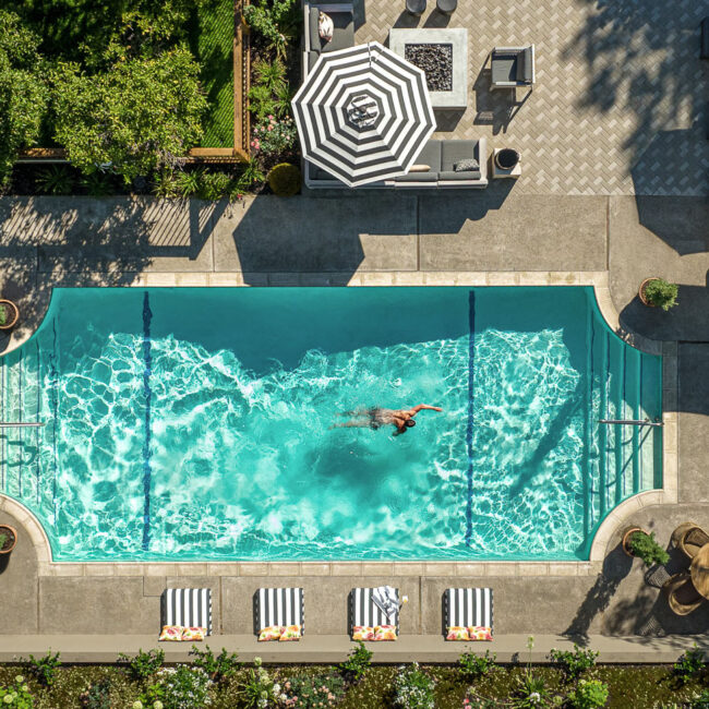 Man swimming in the pool at The Madrona